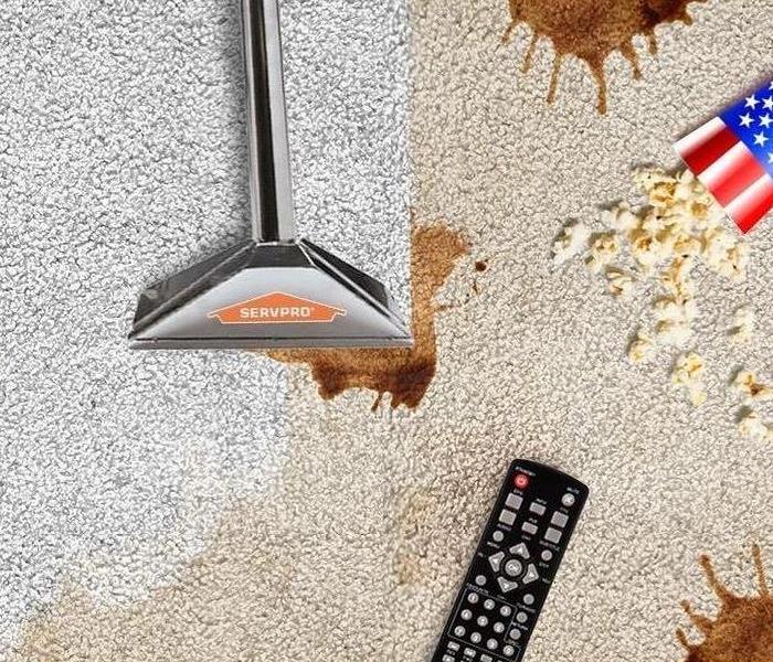 Carpet wand cleaning one side while stains, popcorn and a remote control are on the other side