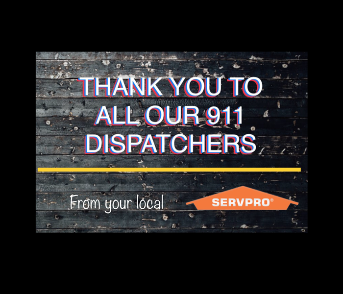 “Thank you to all our 911 dispatchers” “from your local SERVPRO” on black wood background